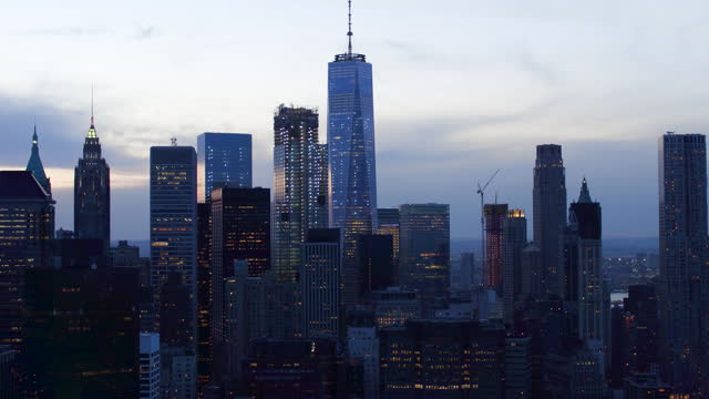 Lower Manhattan skyline, Famous skyscrapers during sunset in the Financial District of New York City. United States, North America. Shot from a helicopter.