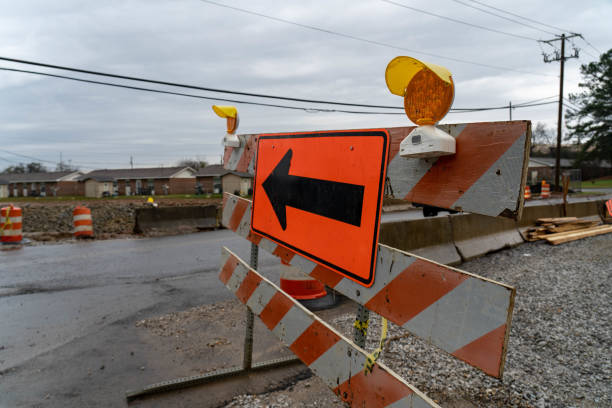 istock Signs and lights direct motorist around road and infrastructure construction. 1494654091