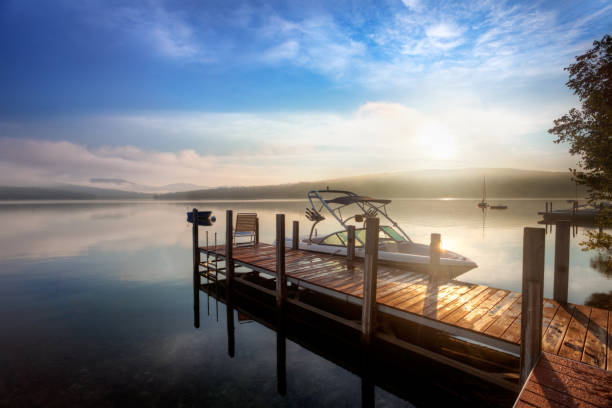 cloudy sunrise over dock - buoy horizontal lake sailing imagens e fotografias de stock