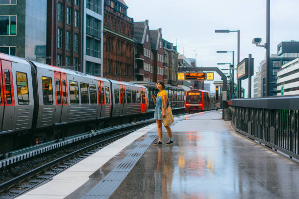 istock Woman waiting for the train on a subway station 1494658549