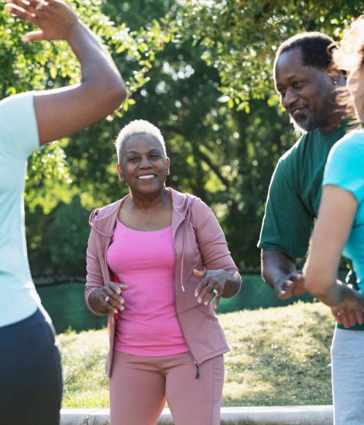 istock Senior African-American woman enjoying exercise class 1494661886