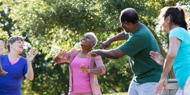 istock Senior African-American women in exercise class at park 1494661907