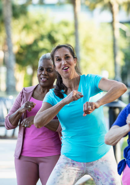 istock Women having fun dancing and exercising outdoors 1494661982