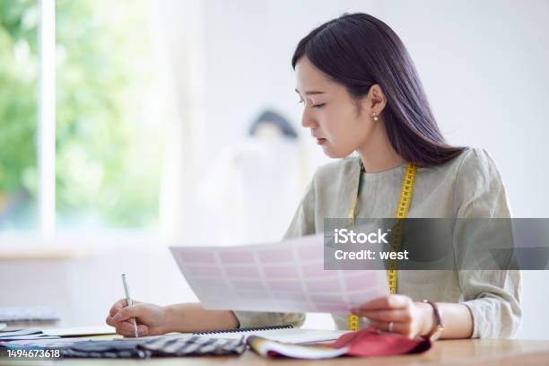 Japanese Woman Working As A Fashion Designer Stock Photo - Download Image Now - 20-29 Years, 25-29 Years, Adult