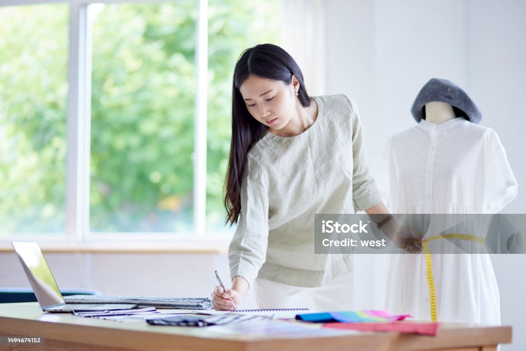 Japanese woman working as a fashion designer 20-29 Years Stock Photo