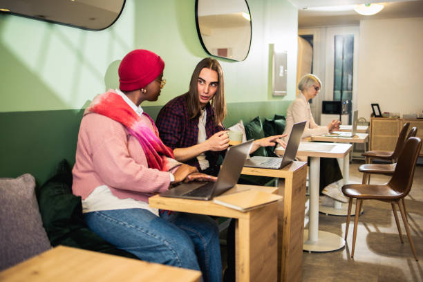 istock Diverse group of young people working 1494677172