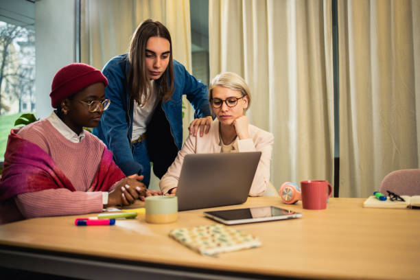 istock Diverse group of young people working together 1494677176