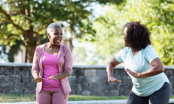 istock Senior woman and Hispanic friend doing dance workout 1494679099