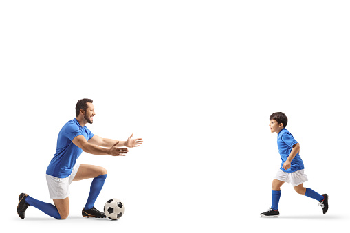 Kid running to hug a football player isolated on white background
