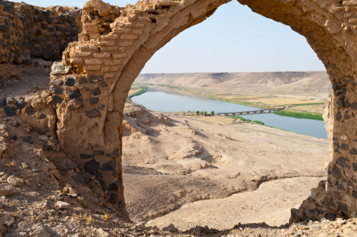 Looking at the Euphrates River through the ruins of Halabiye Fortress in Syria, founded by Queen Zenobia in the 3rd century AD.