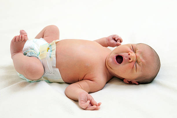 istock One week old baby yawning 149469829