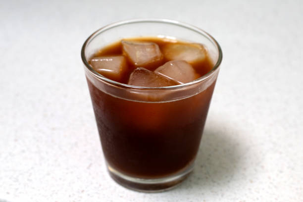 istock Iced black coffee on white background. 1494705624