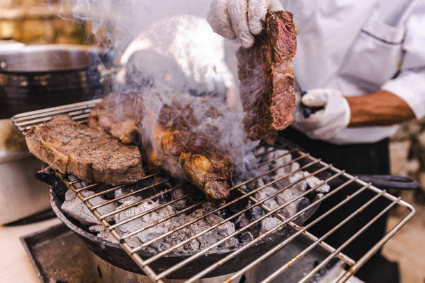 istock Food preparation grilled fish and meat 1494705781