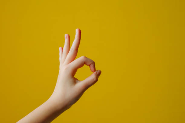 istock Girl child hand shows gesture OK 1494710542