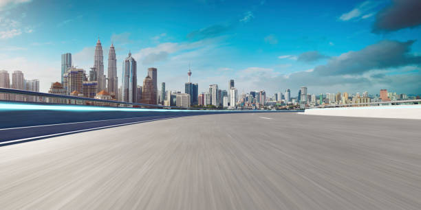 istock Highway overpass motion blur with city 1494711071
