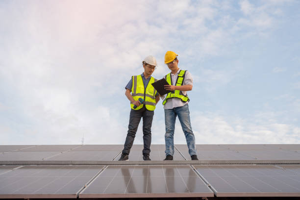 istock Engineering team working on checking and maintenance in solar power plant. 1494717697