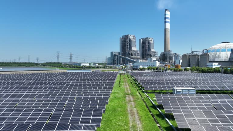 Real Time / Aerial view of thermal power generation and solar power station