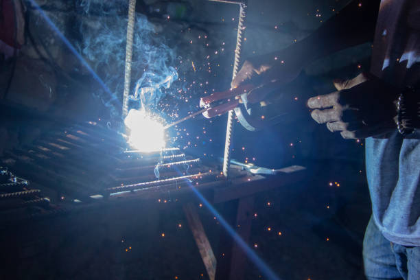 The ironworker is a professional. He generally works in hot or cold steel, but he can also work with iron, which is a pure metal, softer than steel, and which was once more used in ironwork.