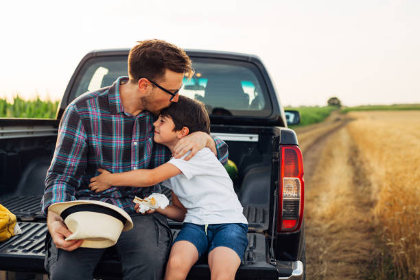 istock father and son outdoor on field 1494734861