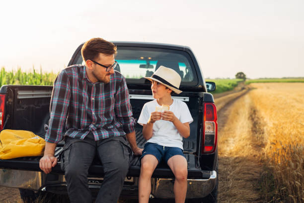 istock father and son outdoor on field 1494734862