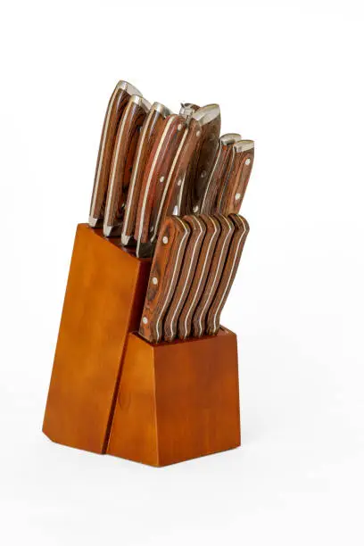 A wooden knife block for a kitchen