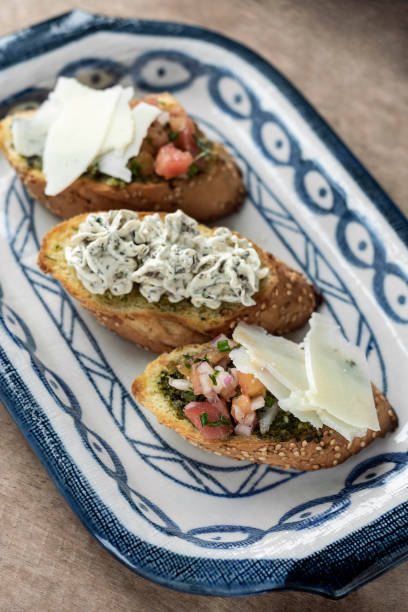istock pinchos tapas with Bruschetta and creamed herb cheese on toast 1494738529