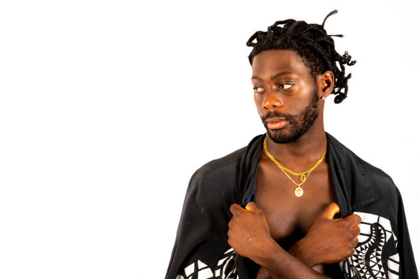 istock Young African Man in a printed shawl looks sideways. 1494741290