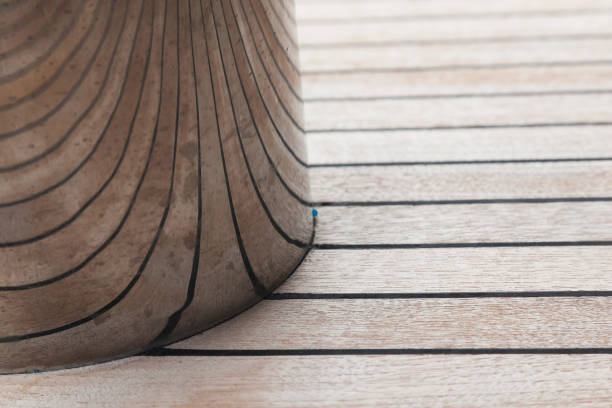 yacht teak deck and stainless steel post with teak deck reflection on it, close up. - wood yacht textured nautical vessel imagens e fotografias de stock