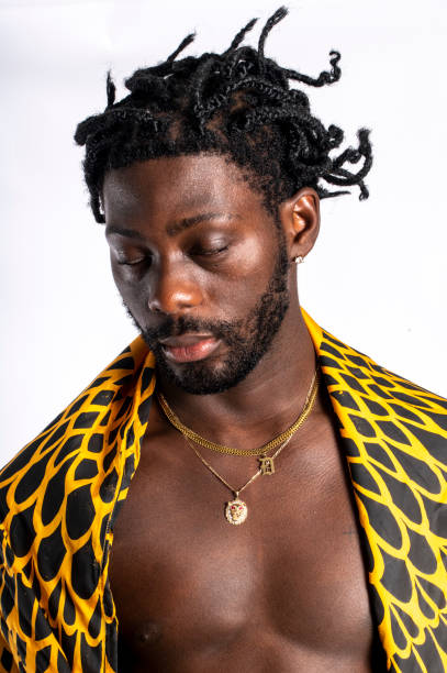 istock Shirtless young African man enjoys himself. 1494742878