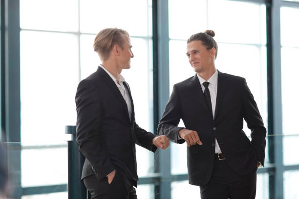 istock Collaborative process of multiethnic business people team working together discussing, researching, brainstorming and planning work at business meeting workplace in modern office building 1494747072