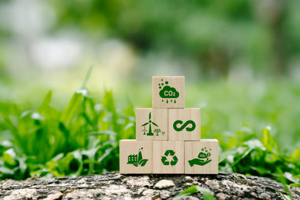 icon reduction of carbon emissions, carbon neutral, Net zero greenhouse gas emissions target, reducing carbon footprint concept, and CO2 emissions target on wooden cubes. circular economy concept icon reduction of carbon emissions, carbon neutral, Net zero greenhouse gas emissions target, reducing carbon footprint concept, and CO2 emissions target on wooden cubes. circular economy concept nature calendar stock pictures, royalty-free photos & images