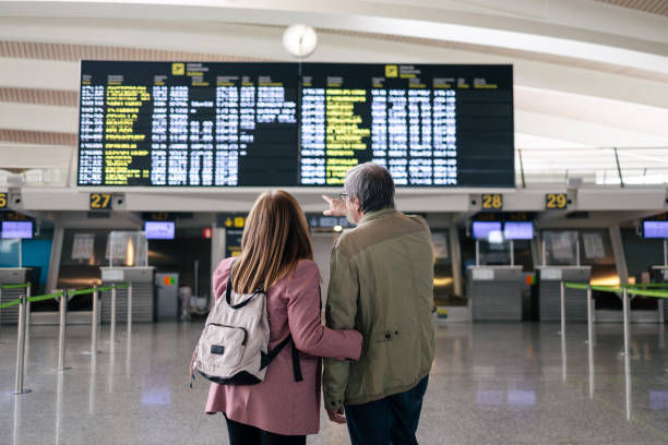 istock Senior couple at airport 1494749416