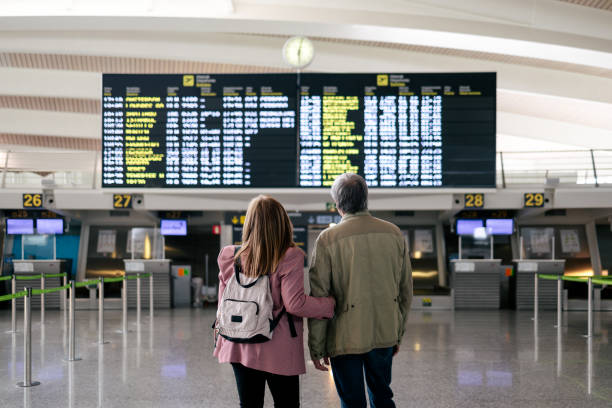 istock Senior couple at airport 1494749523