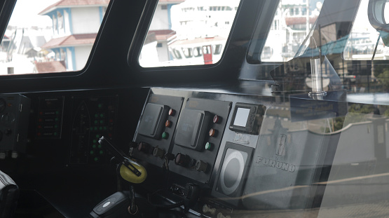 view of ship control engine with safety glass