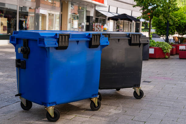 istock Plastic containers for collecting garbage standing in the pedestrian zone. 1494752768