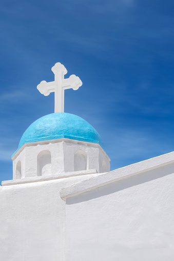 A gorgeous view of a quant church on Oia, Santorini, Greece.