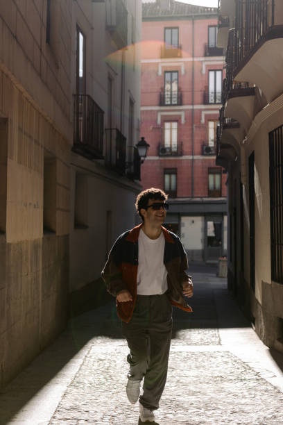 istock Young man running in the city 1494758931