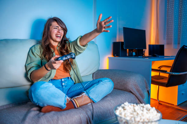 istock Woman losing while playing video games angry 1494759340