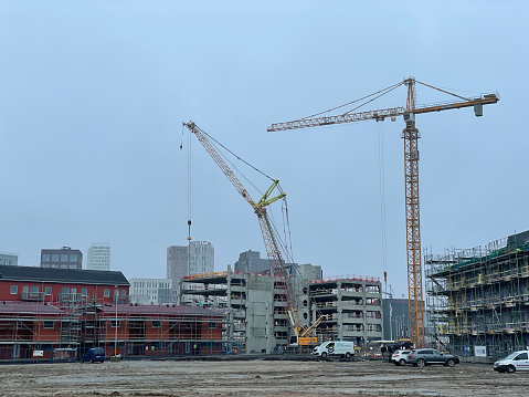 Malmö Hyllie, Sweden - 21 March, 2023  \nDespite the strong real estate crisis in Sweden, Malmo is growing and building sites are thriving. Construction sites in Hyllie, Malmö show one of the fastest growing, modern neighbourhood in the city despite the Swedish housing crisis