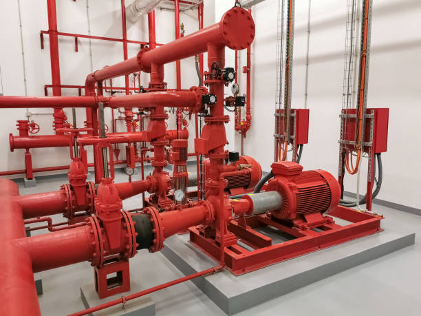 istock View at industrial electrically powered water pumps and pipes, this pumping group serves for water injection for building fires, sprinklers and fire reels View industrial electrically powered pump 1494763510