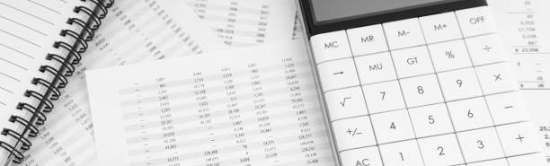 istock Calculator and notebook lying on financial statement . Financial concept. 1494764869