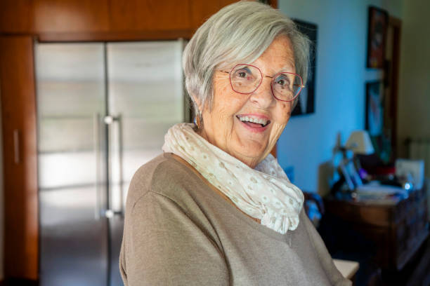 istock Happy smiling elderly grandmother at home 1494765100
