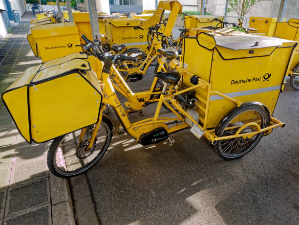 german post bicycles - deutsche post ag package germany occupation imagens e fotografias de stock