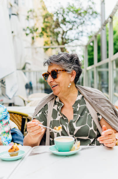 istock Vertical photo of friends chatting while having breakfast 1494766936