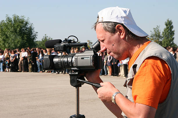 istock cameraman shoot a film. 149476700