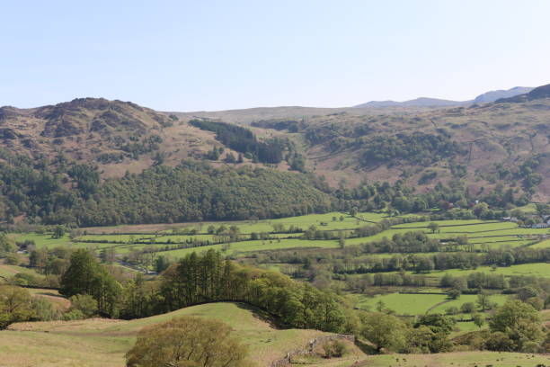 istock Borrowdale valley, Lake District, on a bright summer’s day with views over green fields and surrounding hills 1494768430