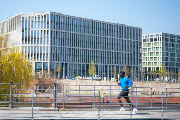istock young sportsman runningoutdoors in modern berlin 1494772931
