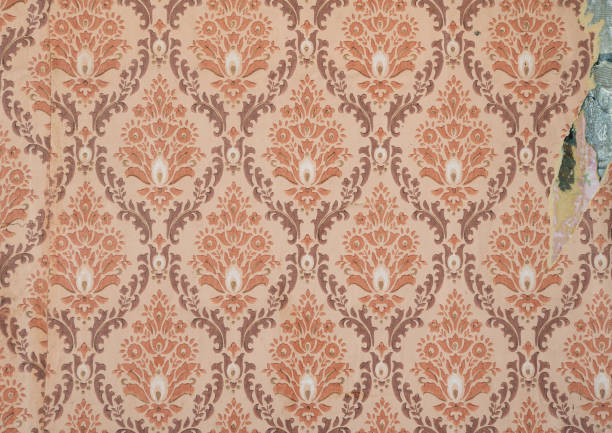istock Old wallpaper on the wall. Old torn wallpaper for texture or background. 1494774889