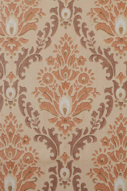 istock Old wallpaper on the wall. Old wallpaper for texture or background. 1494775067