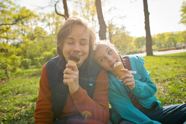 Family enjoys summer in a park